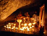 35 Cave Of The Female Yak Horns At The Back Of Dirapuk Gompa Has Statues Of Gotsangpa and Milarepa On Mount Kailash Outer Kora The cave of the female yak horns at Dirapuk Gompa has a slanted roof with statues of Gotsangpa and Milarepa on the seat where Gotsangpa meditated for three years.